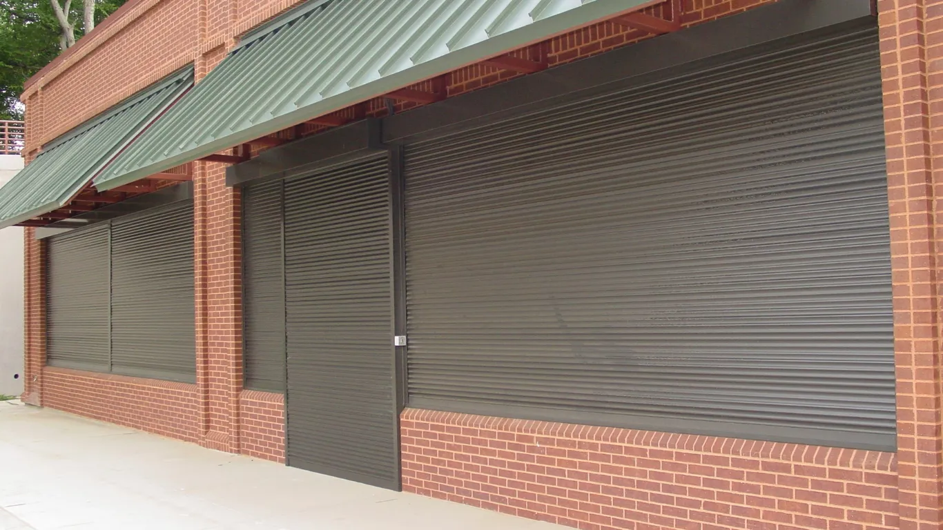 Rollok rolling security shutters on brick building